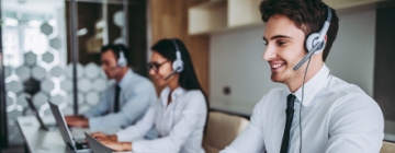 smiling call center workers