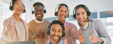 Global call center team in Mexico with members smiling - Best Call Center in Tijuana